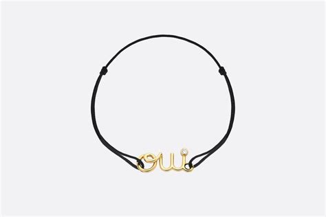 Bracciale Dioramour Oro giallo, diamante e corda nera .